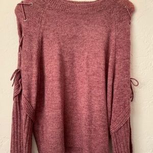 Dark pink sweater with flared sleeves
